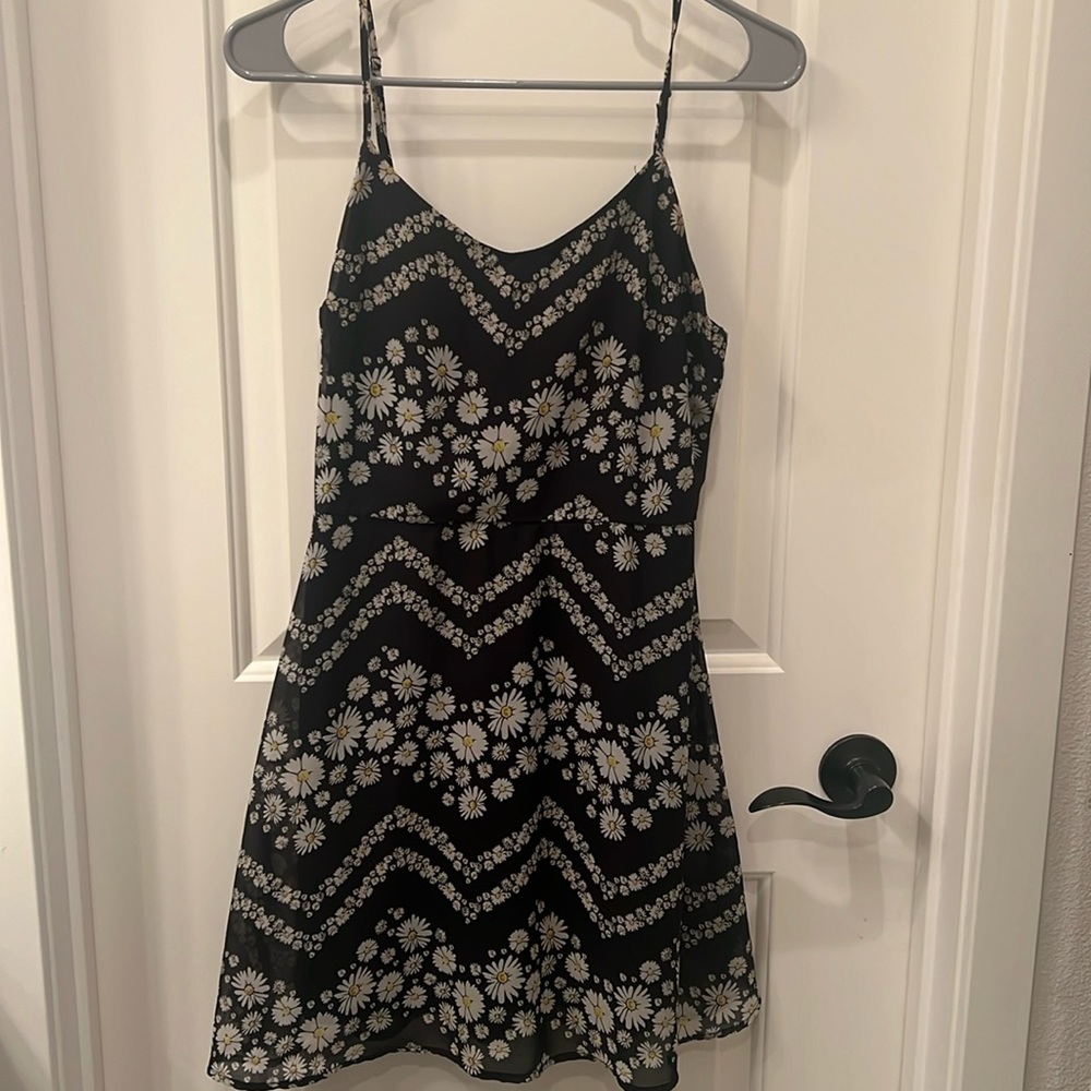 Black dress with daisys in size small from fire Los Angeles